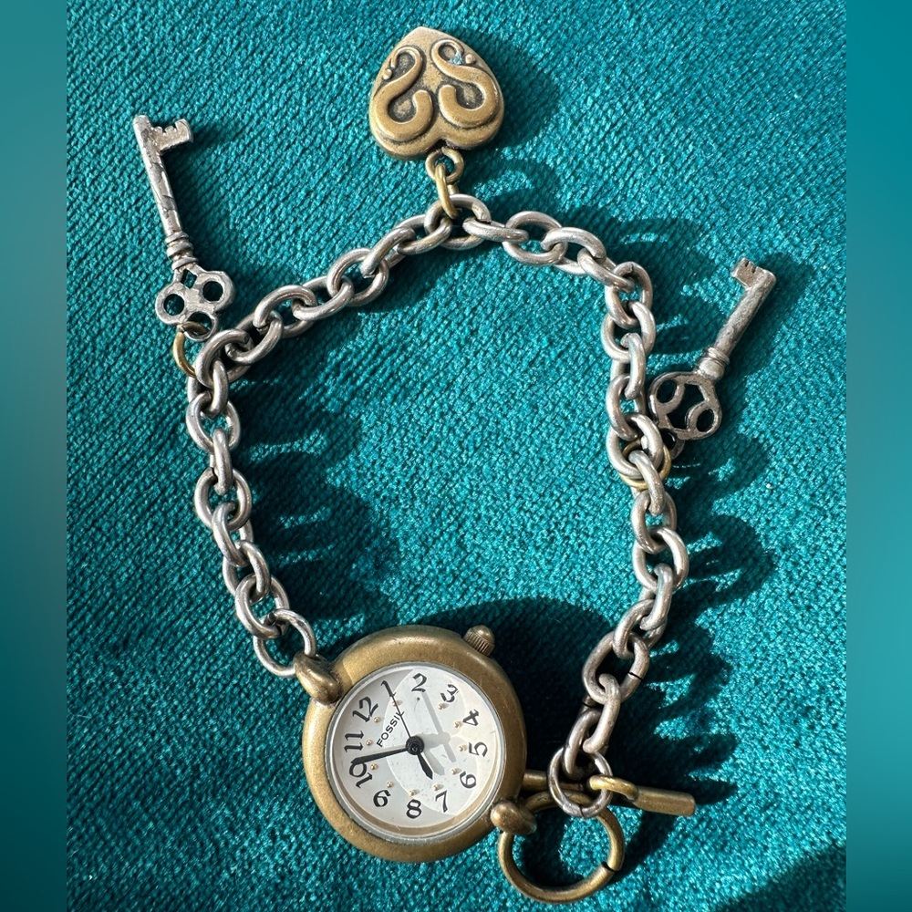 Fossil Watch with charms, battery needs to be changed.
